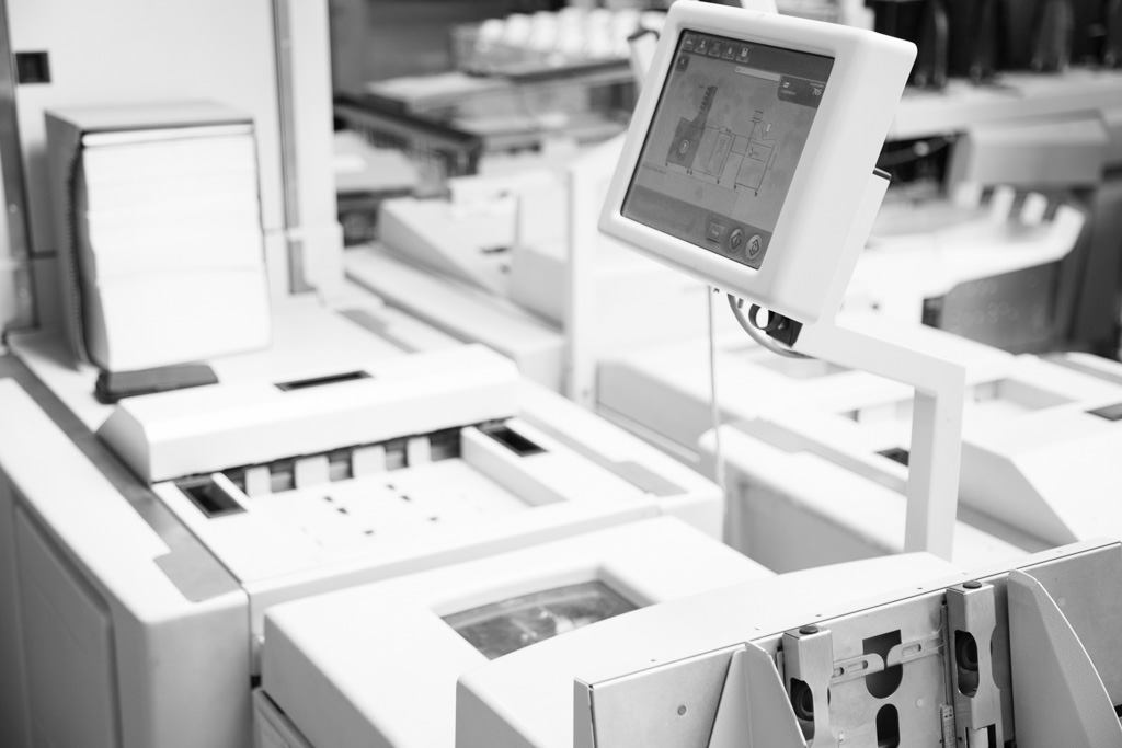 Kuvertiersystem mit optischem Abgleich